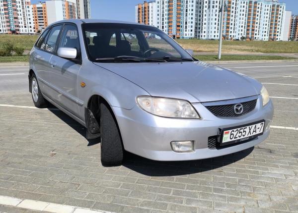 Mazda 323, 2001 год выпуска с двигателем Бензин, 8 818 BYN в г. Минск