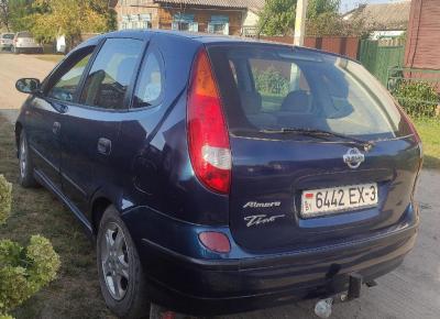 Фото Nissan Almera Tino