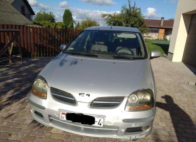 Фото Nissan Almera Tino