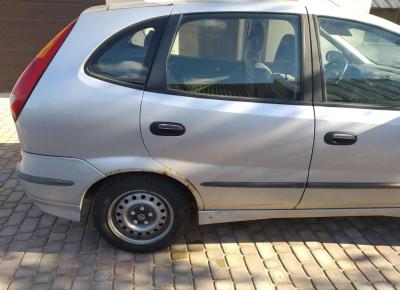 Фото Nissan Almera Tino