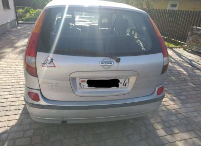 Фото Nissan Almera Tino