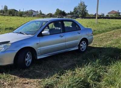 Фото Mitsubishi Lancer