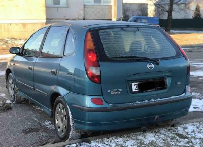 Фото Nissan Almera Tino