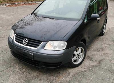 Фото Volkswagen Touran