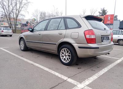 Фото Mazda 323