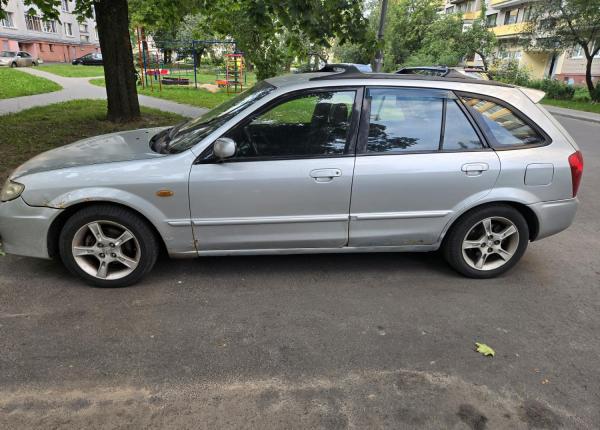 Mazda 323, 2002 год выпуска с двигателем Бензин, 5 081 BYN в г. Минск