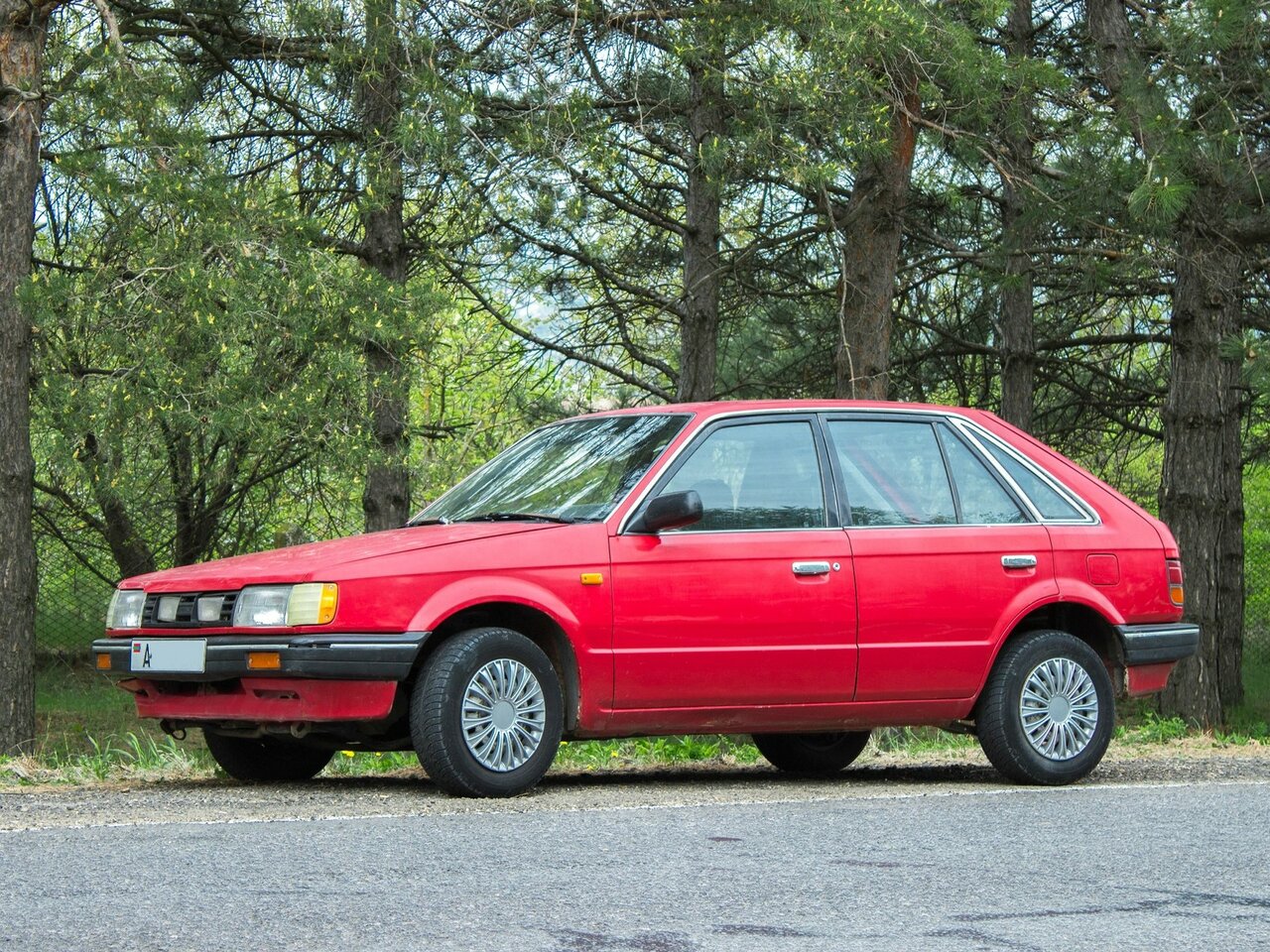 Фото Mazda Familia V (BF)