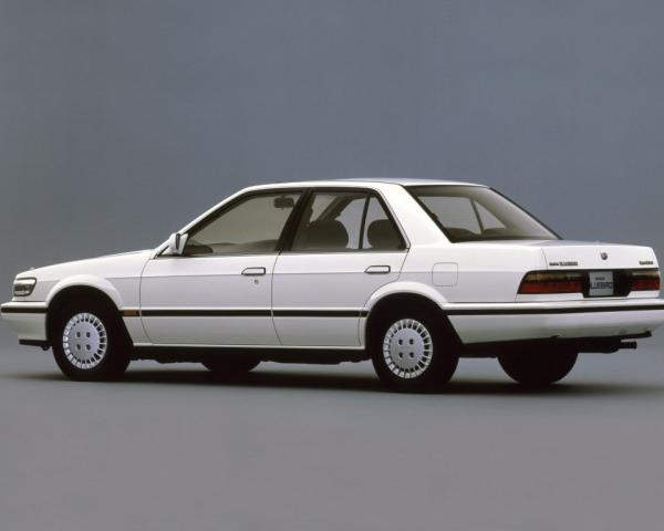 Фото Nissan Bluebird IX (U12) Седан