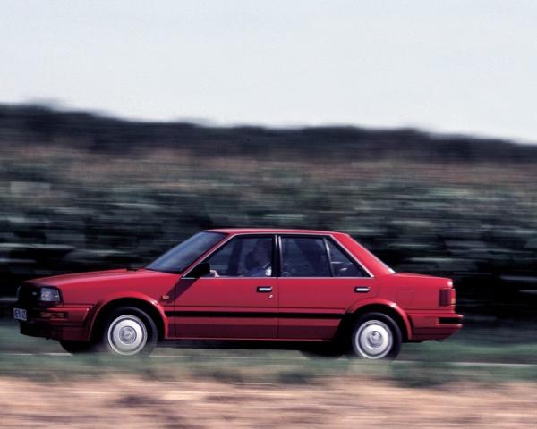 Фото Nissan Bluebird VIII (T12, T72) Седан