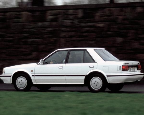 Фото Nissan Bluebird VIII (T12, T72) Седан